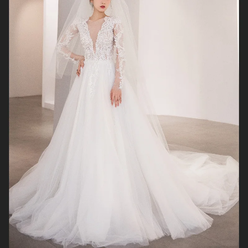 Sheer Long Sleeve A-line Wedding Dress with Deep V Neckline